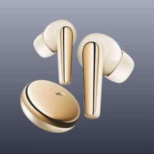 a pair of gold earphones on a white background